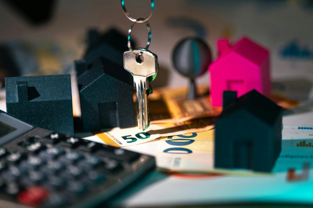 Real Estate Finances with Keys and Model Houses